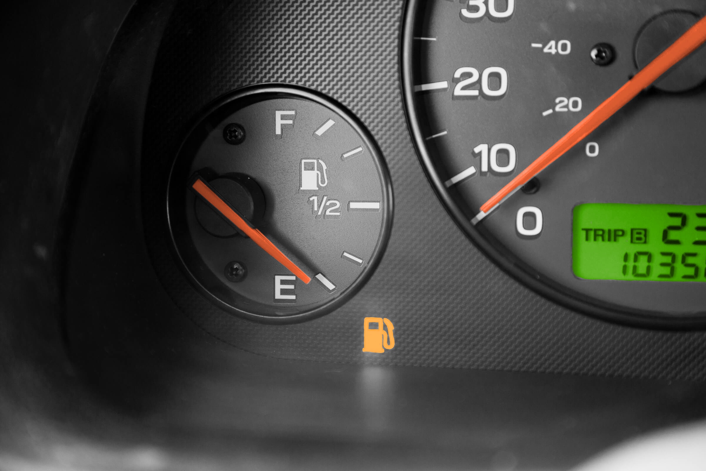 Fuel gauge indicating an empty gas tank