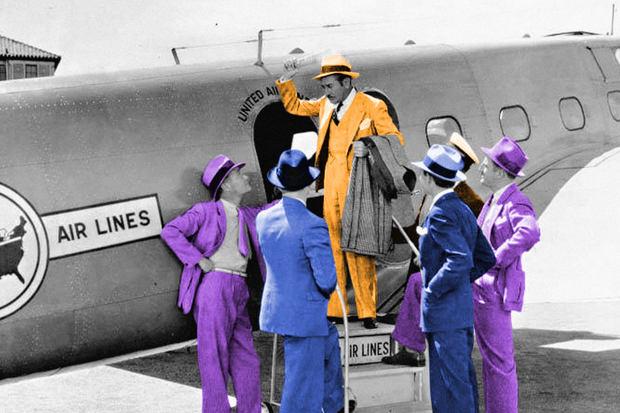 Group of dapper men standing at the open door of an airplane