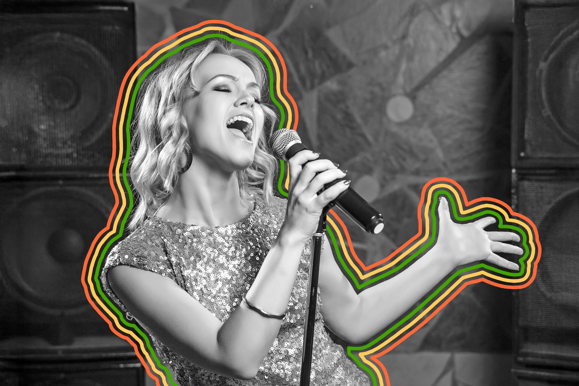 Woman singing into a microphone