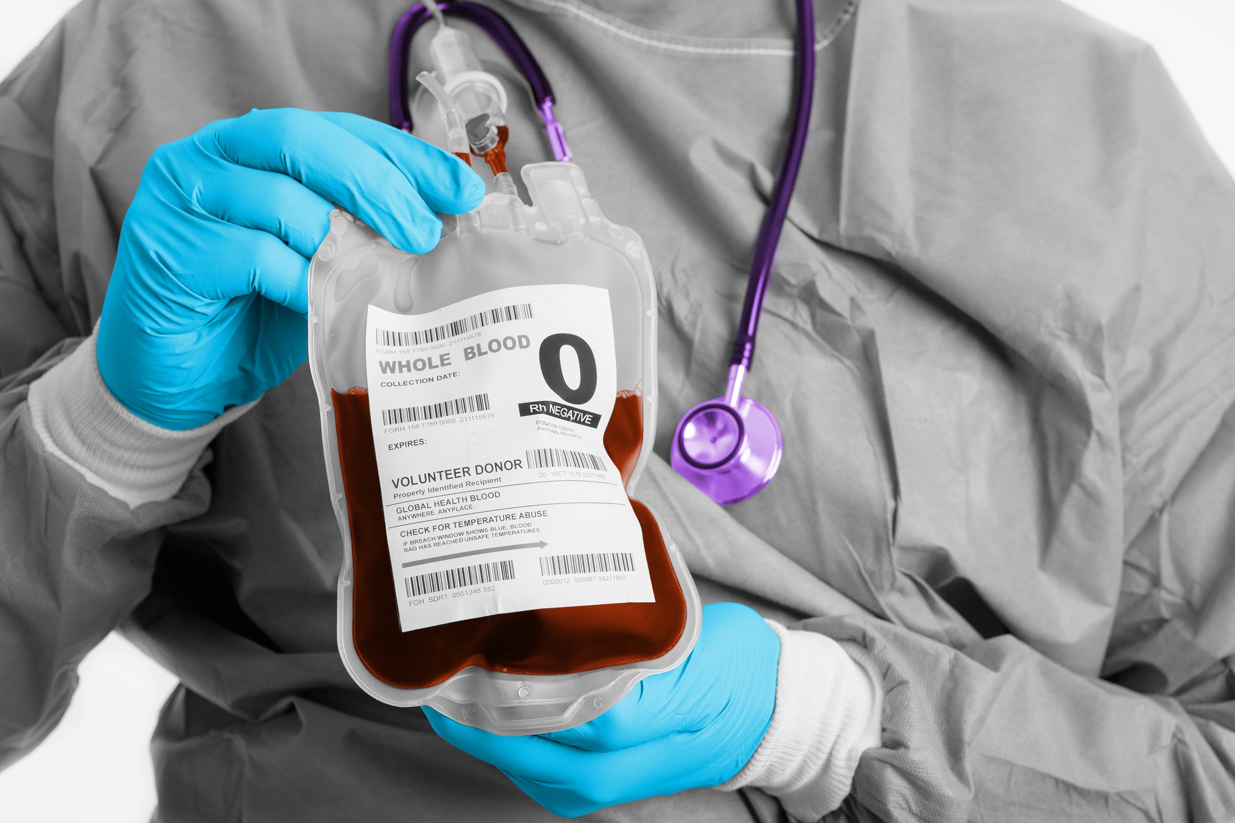 Healthcare worker holding a blood bag