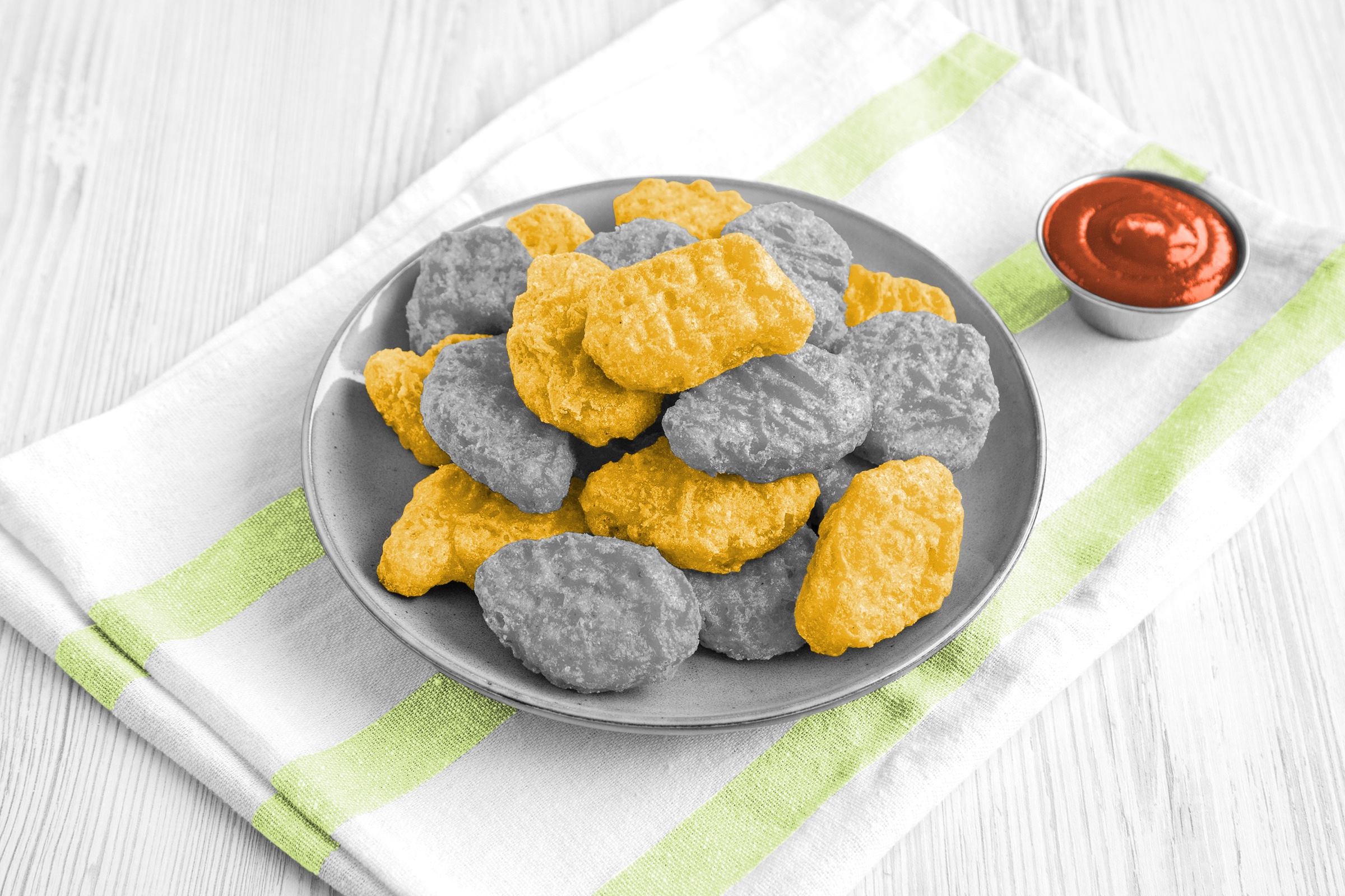 Chicken nuggets with a side of ketchup