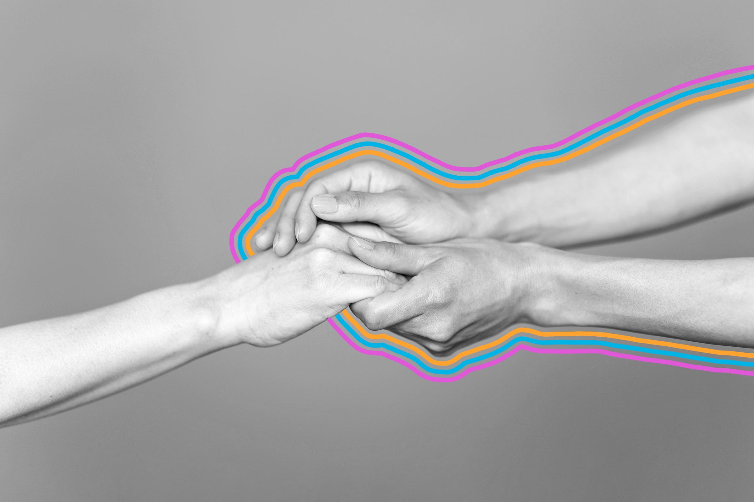 Person holding someone else's hand in their hands