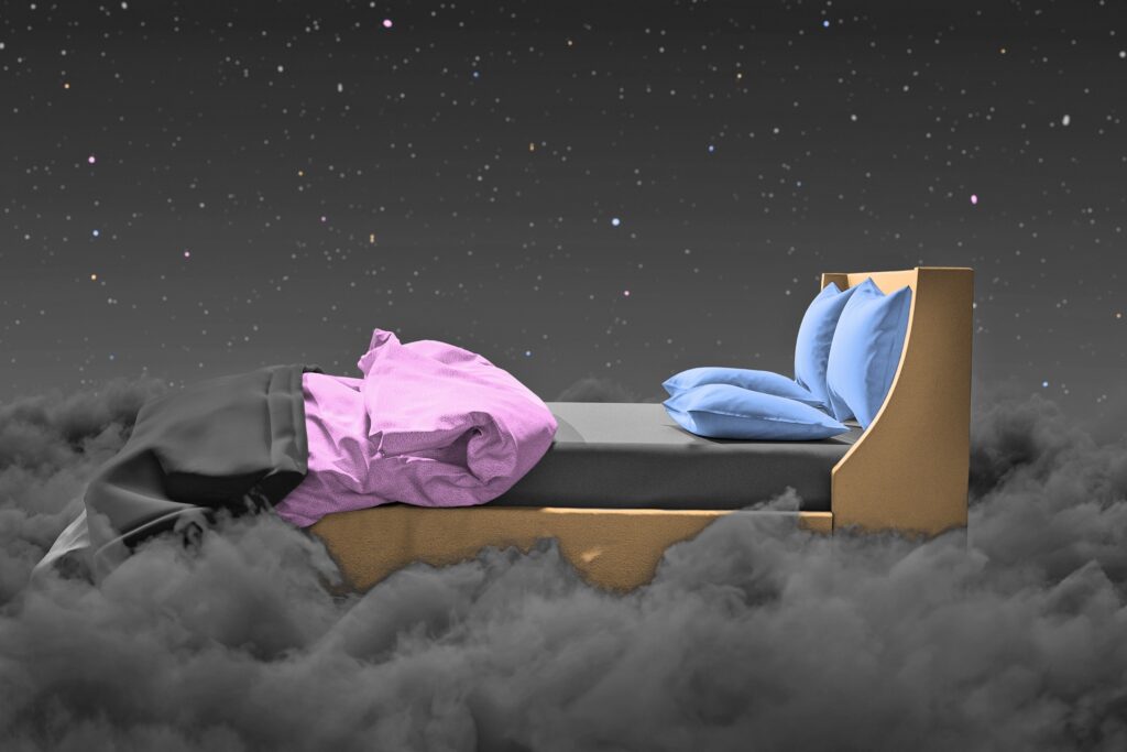 Bed surrounded by clouds and stars