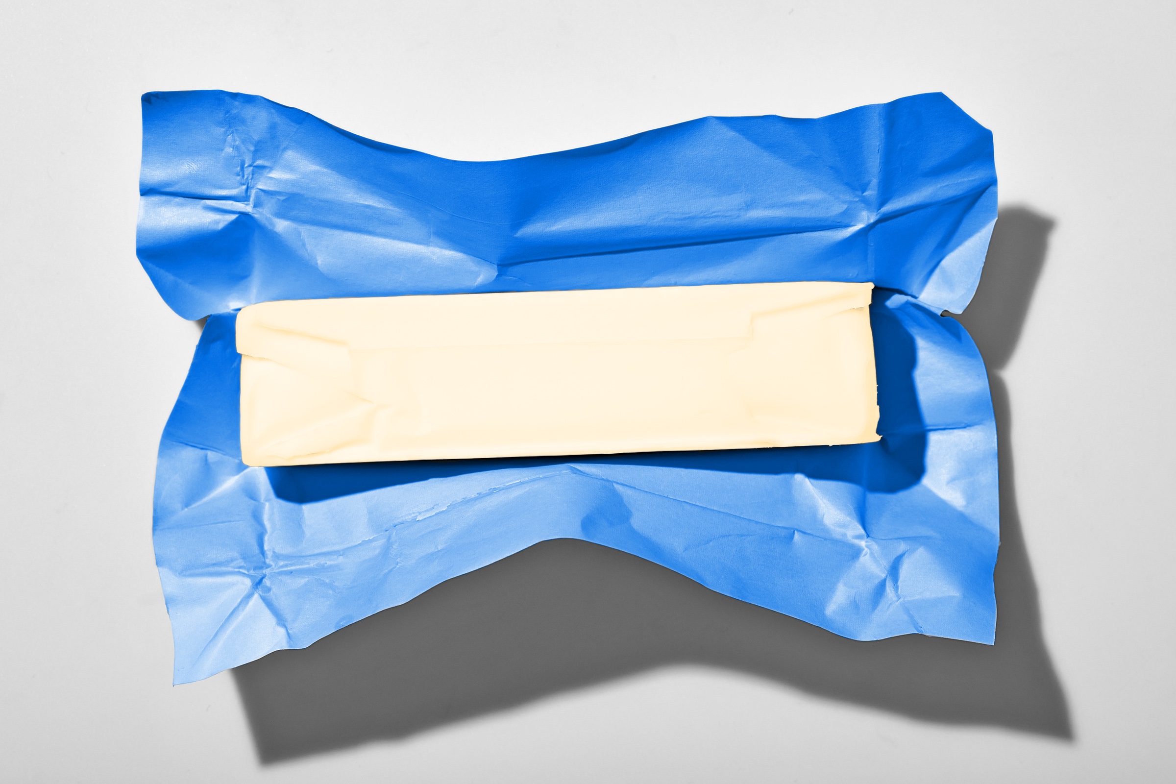 Unwrapped stick of butter